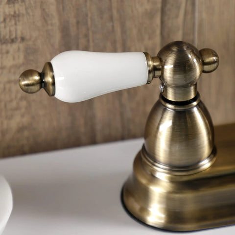 Antique Brass 4-Inch Centerset Bathroom Faucet Deck Mount 3-Hole Setup with Drip-Free Washerless Cartridge handle detail