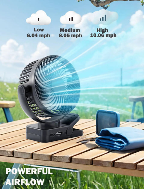 Two Pack Magnetic Clip On Fan For Golf Cart With 12000mAh Battery showing airflow and speed settings on picnic table