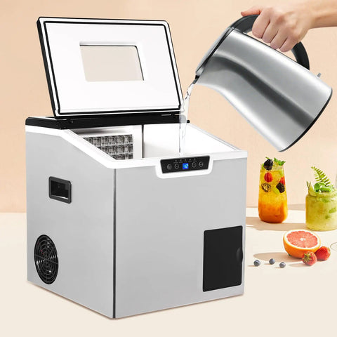 Two In One Countertop Cube Maker And Crushed Ice Crusher With Bright LCD Display pouring water into ice maker.