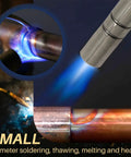 Close-up of Pro Grade Self Ignition Propane Torch Head Kit With Trigger Start in use on copper pipe showing pencil flame.