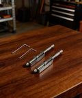 Super Cool Spring Loaded Screwdriver Bit Extension With Non Magnetic Grip For Slotted And Phillips Torx Bits In Silver. This One-Handed Pro Repair Tool Is A Total Game Changer For Fastening Jobs And Keeps Fasteners Secure While You Work Hard On Any Tough. silver metal bit holders on wood table with hex bits