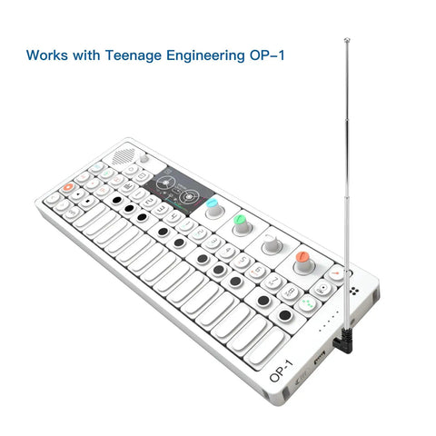 Extendable 3.5mm FM Radio Antenna attached to Teenage Engineering OP-1, telescoping four-section steel aerial boosting FM reception.