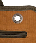 Close-up of Grab-And-Go Super Roll Tool Roll showing metal grommet and zippered pocket on heavy-duty Duckwear canvas.