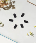 Kickass Stainless Steel Ball Plunger Screws 50 Pack M4 X 6 Hex Socket Set Screws arranged on a surface with flowers.