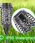 Close-up of Blue Outdoor Solar Torch Lights 12 Pack With Flickering Flame Waterproof Mini Tiki Torches showing design detail.