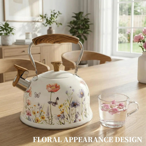 Stovetop Whistling Tea Kettle Two Point Seven Quart Floral Pattern Stainless Steel Tea Pot With Wood Pattern Handle on table