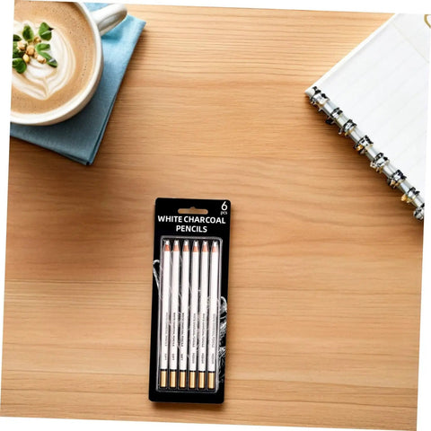 Six Piece Sketching Pencils Set for Drawing, Pro Grade Graphite Leads for Artists and Students in black packaging on desk