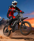 Rider on Powerful 2000W Electric Dirt Bike For Adults With 48V 18Ah Battery 110Nm Torque Pedal Assist in desert landscape