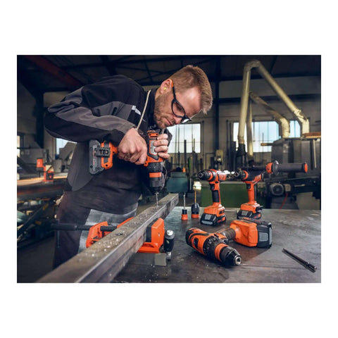 Man using Ultra Lightweight Brushless Cordless Drill Featuring Four Speeds And Mechanical Torque Control for precise drilling on metal.