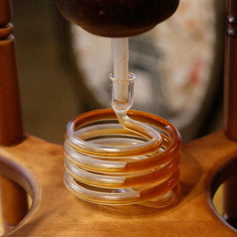 Close-up of the drip system of the Slick Cold Brew Coffee Tower Featuring A Reliable Ice Drip System For Bold Flavor Kick.
