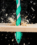 Heavy Duty Masonry Drill Bit Set With Ten Durable Carbide Tips For Cracking Concrete Brick And Tile Like A Pro, drill in action on wood.