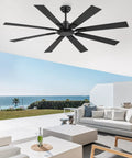 65 Inch Outdoor Ceiling Fan With Remote No Light Damp Rated Black Modern Design installed in a patio overlooking the ocean.