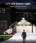 50W Led Security Light with Motion Sensor, Pir Flood Light Ip67 Waterp,，， illuminating a driveway with motion detection at night.