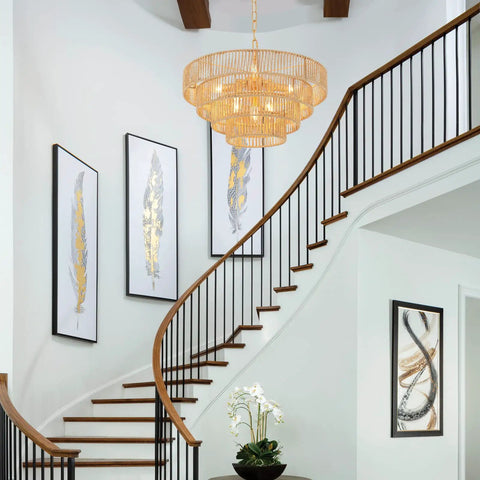 Six Light Hand Woven Rattan Pendant With Four Round Brass Frame Spheres hanging in modern staircase area