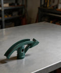Premium Deskbloom Manual Hand Tube Bender For Copper And Aluminum Pipes on a work surface, showcasing ergonomic carbon steel design.