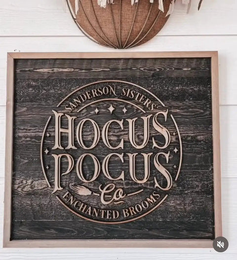 Hocus Pocus sign with wood background featuring the Sanderson Sisters and Enchanted Brooms design, rustic home decor.