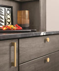 Kitchen with Versa Champagne Bronze Cabinet Pull Five And One Sixteenth Inch Center To Center on grey cabinets