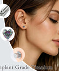 Model wearing Top Notch Implant Grade Titanium Heart Earrings With Lustrous Cubic Zirconia Secure Screw Back Closure, showing side profile.
