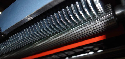 Close-up of 20 Inch Planer With Helical Cutterhead, Auto Depth Lock With Twin Nitrogen Cylinders, German Carbide Inserts, 4 Sided Indexed Cutting Inserts, Heavy Cast Iron Construction For Smooth, Precise Planing Built Tough For High Volume Milling And Smooth Finishes cutting blades