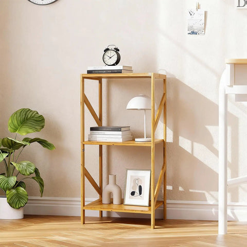 Rustic Bamboo 3 Tier Bookshelf Narrow Storage Rack for living room, featuring books, decor items, and a plant on wooden floor.