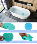 Slick Silicone Tub Stopper Two Pack, 5 Inch Flat Suction Bath Plug With Heavy Grip in teal on a bathtub.