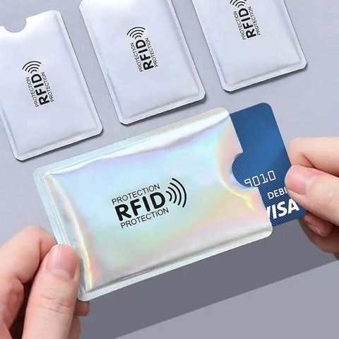 Person holding a colorful RFID Blocking Card Sleeves Set For Women, 10 Pack Credit Card Protectors, Identity Card Shield.