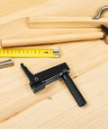 Grab And Go Ready Portable Aluminum Woodworking Clamp For Workbench With Quick Clamping Heavy Duty Vise next to tools on a bench