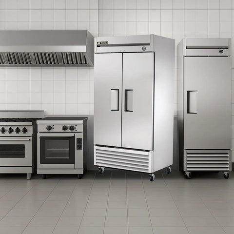 No Nonsense 40 Inch Reach In Freezer With 35 Cubic Feet Upright Cold Storage Tough Stainless Steel Cabinet in commercial kitchen.