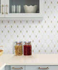 Tenedos Thassos white marble and gold glass diamond mosaic tile sheet; 3x3.5in waterjet-cut, polished.