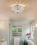 Lit 13 Inch Chrome Flush Mount Crystal Ceiling Light With 3 K9 Crystals Modern Chandelier In a Bright Bedroom