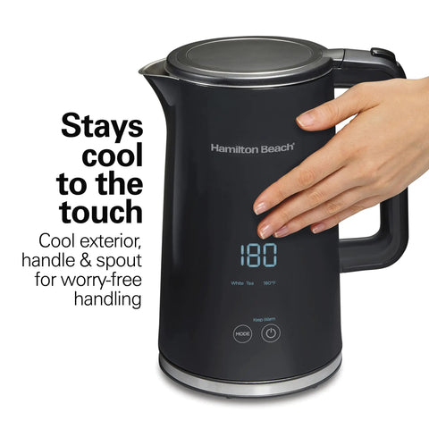 Person touching Digital Temperature Control Tea Kettle 1.7L With 5 Preset Modes For Green White Oolong And More Keep Warm Function Fast Boil 1500W BPA Free Cool Touch Exterior Black