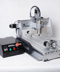 6040 CNC Router With USB Port 2200W High Power Engraving Milling Drilling Carving Machine For Woodworking on a workbench