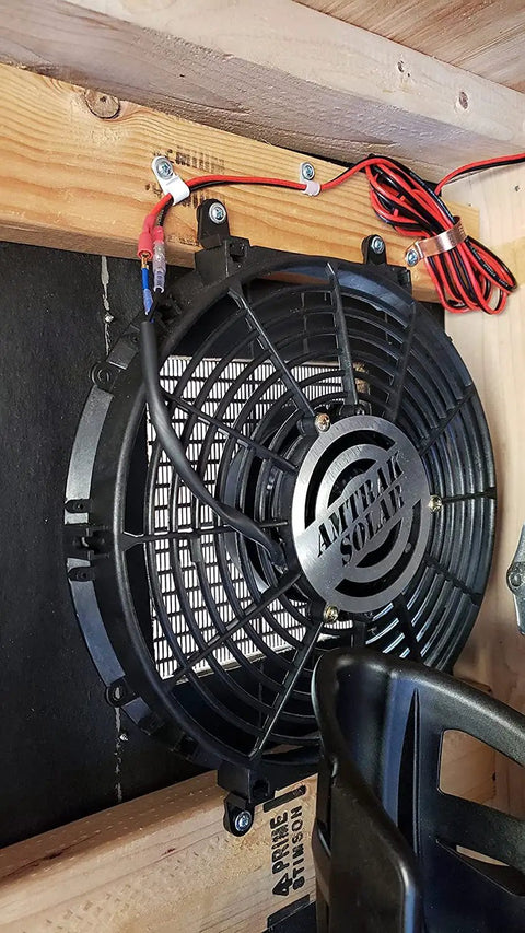 Solar Powered 12 Inch Attic Fan, 50W Quiet Yet Mighty Vent installed in wood frame with visible wiring for efficient airflow
