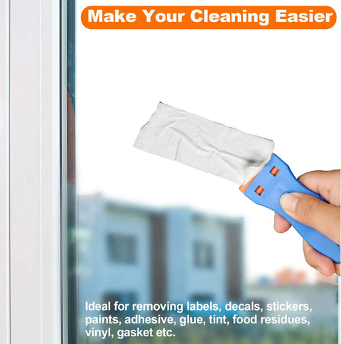 Hand using Plastic Razor Blade Scraper Set With 2 Scrapers And 60 Replacement Blades, Easy Grip Ergonomic Handle on glass window
