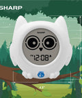 Ready to Wake Owl Sleep Trainer for Kids Color Changing Clock with nightlight in white silicone case, showing 4.5-inch size.