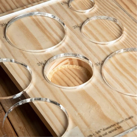 Clear Acrylic Inlay Template Kit Dead Simple Layouts For Woodworking Circle And Grommet Guides Real Deal Precision Stencils set on wood.