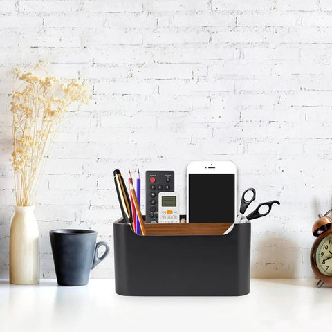 Black Desk Organizer and Remote Holder with Pen and Phone Slot on desk with accessories, space saving with removable dividers