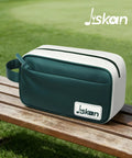 Green and white Compact Golf Pouch Bag For Men And Women on a bench, Handy Valuables Organizer for cart or bag.