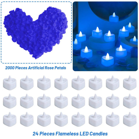 Heart-shaped pile of blue silk rose petals beside 24 flameless LED candles, part of Blue Silk Rose Petals Romantic Night Decor Set.