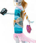 Dawn Of The Dance Lagoona Blue Reproduction Doll Prepped For A Ripper Party with sea-blue gown and pink accents.