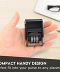 Self Inking Received Date Stamp With Blue And Red Ink For Business Files Featuring 12 Year Roll Over Dial shown in hand for size reference.