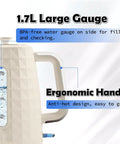 Close-up of a beige 1.7L Electric Kettle With Fast Boil 1200W For Quick Hot Water showing ergonomic handle and water gauge.