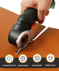 Heavy Duty Cordless Electric Scissors With Rechargeable Power Shears cutting through brown leather with ergonomic grip.
