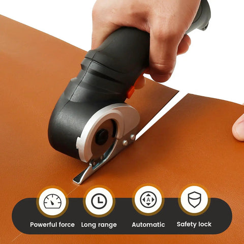 Heavy Duty Cordless Electric Scissors With Rechargeable Power Shears cutting through brown leather with ergonomic grip.