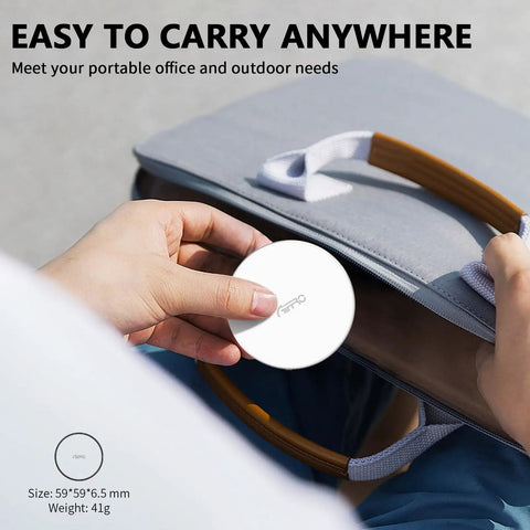 Person placing Magnetic Portable SSD 1TB For iPhone MagSafe, Crazy Fast 2000MB/s USB 3.2 Gen 2x2 20Gbps Type-C into bag.