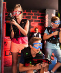 Kids wearing Heavy Duty 2 Pack Tactical Security Eyewear With Quick Snap Lenses for Nerf match play in bright game room.