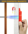 Hand holding FewNvWa Handheld Stud Finders for Wall Metal Detection in Wood And Drywall, Red, detecting screw in drywall.