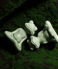 Kick Up Your Bathroom Style With These Pretty Dang Cute Ceramic Frog Toilet Bolt Cover Set Featuring Sturdy Tank Caps And Whimsical Hardware Accessories - glazed ceramic frog covers.