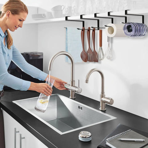 Absolute Knockout Tumbler Lid Organizer That Snaps Right Onto Standard Cups And Keeps Your Counter Dead Clean Without Any Hassle While Holding Ten Sip Lids In Chill Modern Black Design positioned above kitchen sink.
