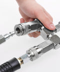 Hand holding a 2-Way Air Hose Splitter Manifold With Quick Connect Fittings Two Universal Type Couplers And Industrial Type Plug